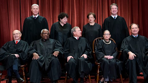 The justices of the US Supreme Court gather for a group portrait. Front row, from left: Associate Justice Stephen Breyer, Associate Justice Clarence Thomas, Chief Justice John Roberts, Associate Justice Ruth Bader Ginsburg and Associate Justice Samuel Alito. Back row, from left: Associate Justice Neil Gorsuch, Associate Justice Sonia Sotomayor, Associate Justice Elena Kagan and Associate Justice Brett Kavanaugh. 