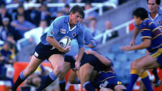 Tim Gavin takes a carry for the Waratahs in a match in 1996. 