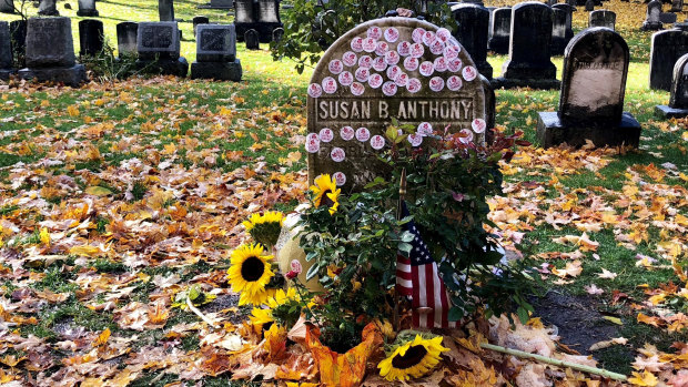 Susan Anthony’s grave decorated with ‘I Voted’ stickers in Rochester, New York, after people voted in the midterms.