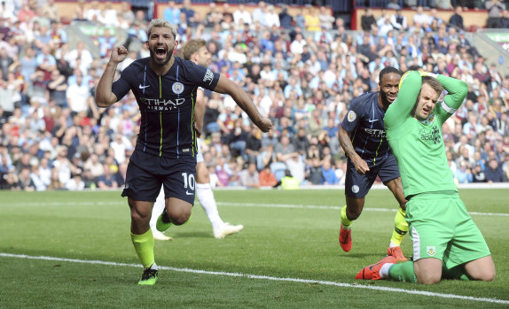 Manchester City's Sergio Aguero celebrates after scoring his side's opening goal against Burnley at Turf Moor on Sunday.