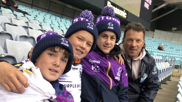 Storm fan and Canberra dad Chris Anderson, 40, said while it was "a little bit weird" seeing most people in masks at the stadium, his family was "excited" to be there unlike so many Storm fans from Victoria.