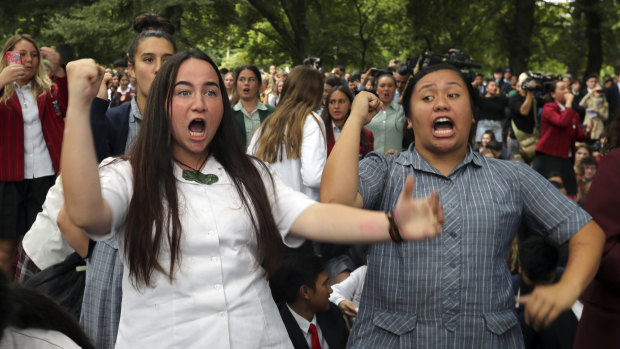 New Zealand students perform the haka during a vigil to commemorate victims of the Christchurch shootings.