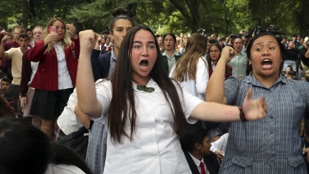Students perform the Haka during a vigil to commemorate victims of Friday's shooting, outside the Al Noor mosque in Christchurch, New Zealand.