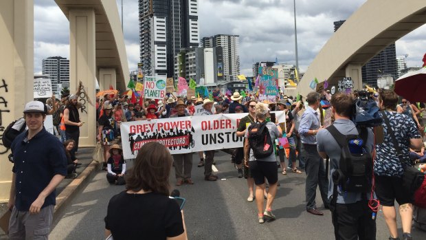 Activists blockade Brisbane's William Jolly Bridge on the final day of Extinction Rebellion's week of protests.