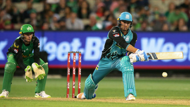 Anything goes: Brendon McCullum of the Heat tries a reverse sweep.