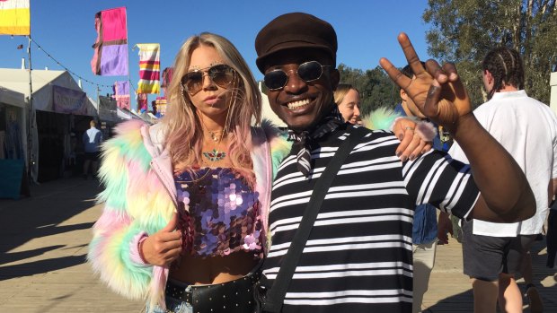 Tayla Crowther, 24, and Cyril Quaynor, 25, spent hundreds of dollars on their festival outfits. 