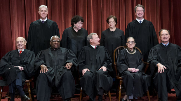 The justices of the US Supreme Court gather for a group portrait. Front row, from left: Associate Justice Stephen Breyer, Associate Justice Clarence Thomas, Chief Justice John Roberts, Associate Justice Ruth Bader Ginsburg and Associate Justice Samuel Alito. Back row, from left: Associate Justice Neil Gorsuch, Associate Justice Sonia Sotomayor, Associate Justice Elena Kagan and Associate Justice Brett Kavanaugh. 