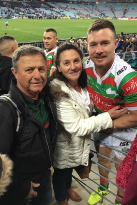 Family affair: Damien Cook with parents Graham and Anne.