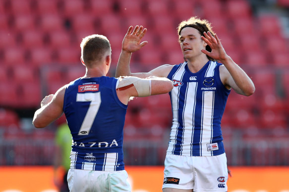 Ben Brown celebrates a goal with Jack Ziebell.