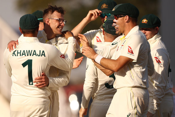 Todd Murphy celebrates taking the wicket of KL Rahul.