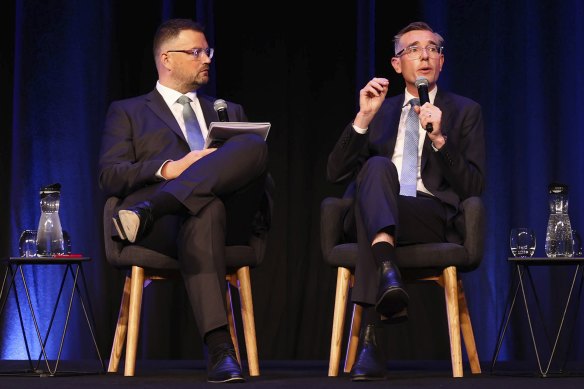 Premier Dominic Perrottet with Herald editor Bevan Shields at the Sydney Summit at the International Convention and Exhibition Centre on Monday.