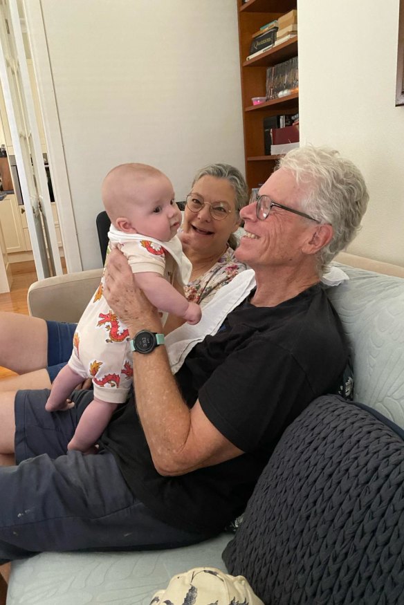 Nicki Hutley, husband Peter and their first grandchild Piper.