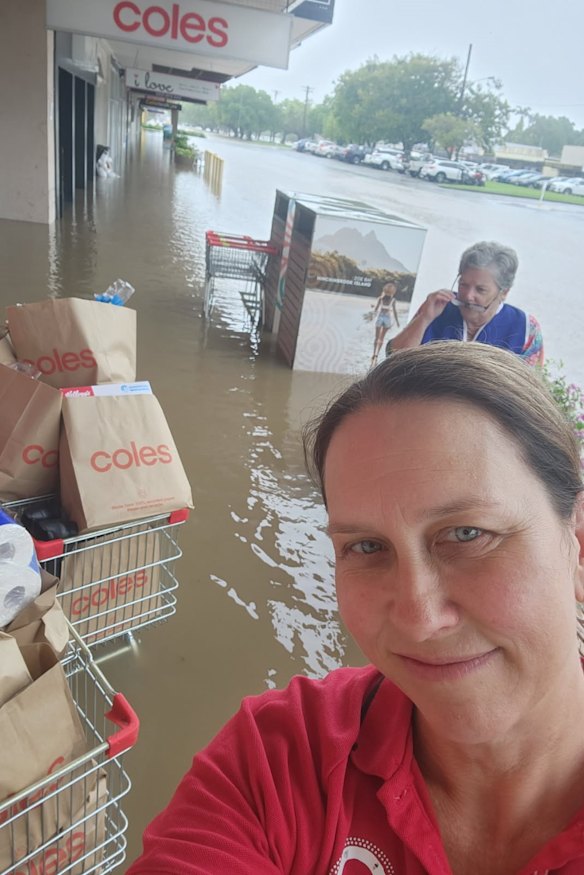Coles duty manager Marcia Glindermann collecting supplies from the supermarket.