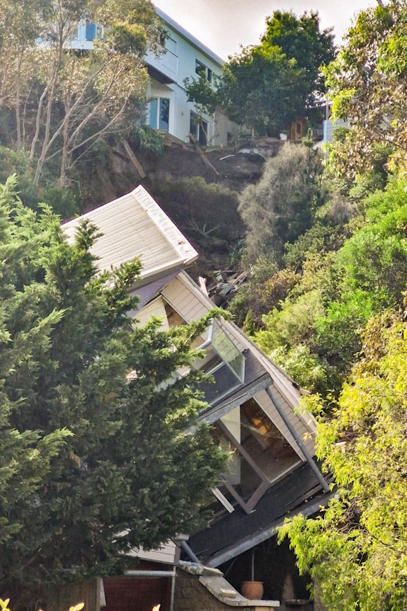 A house at the bottom of the escarpment was destroyed in the January 14 landslide.