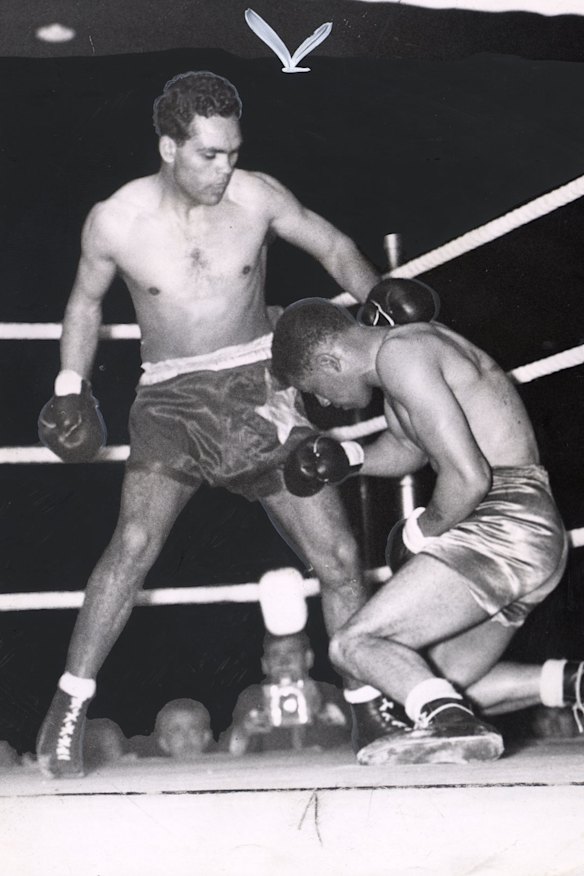 Dave Sands drops Dick Turpin during their bout in London.