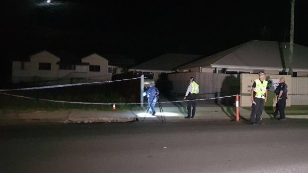 The crime scene set-up at the Targo Street residence in Bundaberg.