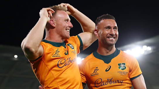 GOLD COAST, AUSTRALIA - SEPTEMBER 12: Reece Hodge and Quade Cooper of the Wallabies celebrate winning the Rugby Championship match between the South Africa Springboks and the Australian Wallabies at Cbus Super Stadium on September 12, 2021 in Gold Coast, Australia. (Photo by Chris Hyde/Getty Images)