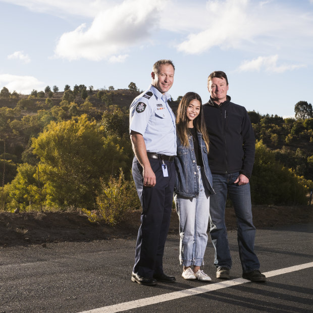 Kathleen Bautista with first responders ACT Policing search and rescue coordinator Lachlan Ryan and former ACT Parks area manager Tim Chaseling. Kathleen says she's grateful to the emergency services for her rescue.