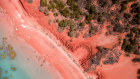 A bird’s-eye view of the astonishing colours – and the very red soil – at Roebuck Bay in Broome.