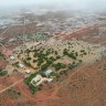 Search for missing group hampered as six months’ rain in 24 hours cuts off WA from eastern states