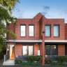 Modern Carlton North home sells for $1.615m in election day auction