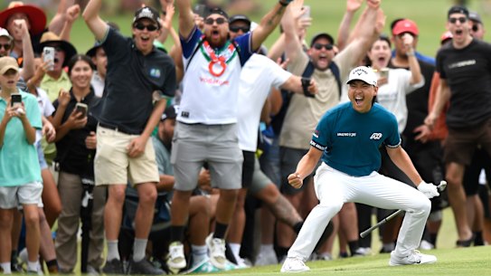 Min Woo Lee celebrates his eagle on the ninth hole.