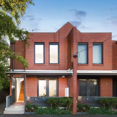 Modern Carlton North home sells for $1.615m in election day auction