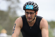 Steven Sorbello competes in the cycling leg of the Noosa Triathlon. “The town comes alive on the triathlon weekend and there are nice places to kick on for the fourth leg – lunch.”