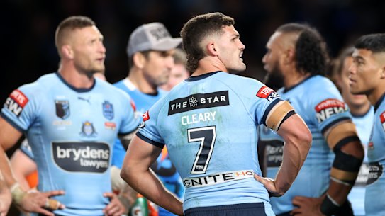Nathan Cleary and the Blues gather under the posts after conceding a try.