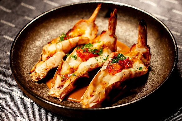 Grilled tiger prawns with ssamjang butter and bisque.