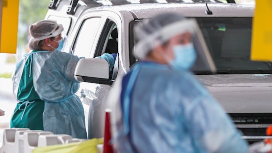 Nurses at a drive through COVID-19 testing facility in Geelong. 