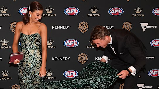 Patrick Cripps of the Carlton and Monnique Fontana.