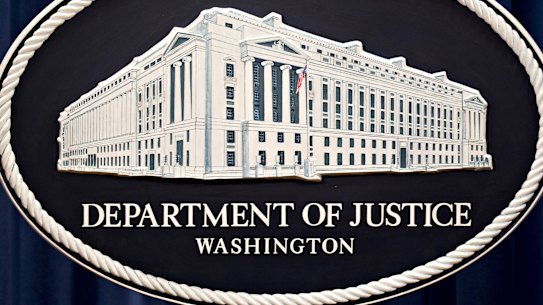 The Department of Justice seal.