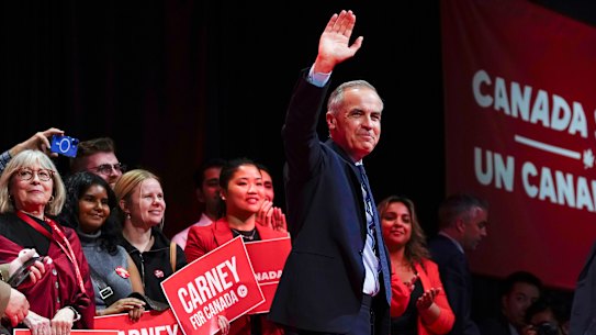 Canadian Prime Minister Mark Carney waves after his speech at his campaign headquarters after the Liberal Party won the Canadian election in Ottawa, Tuesday, April 29, 2025. (Justin Tang//The Canadian Press via AP)