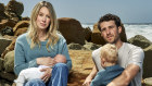 Elizabeth Holmes poses for The New York Times with partner Billy Evans and their two children.