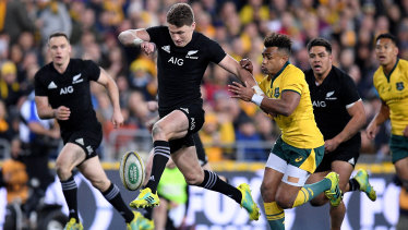 Exploiting mistakes: Beauden Barrett toes the ball ahead to set up a try for himself.