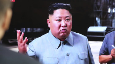 North Korea's Kim Jong-un, seen here on a TV screen in Seoul, has again fired projectiles into the sea.