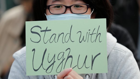 A Hong Kong protester shows support for Uighurs and their fight for human rights.