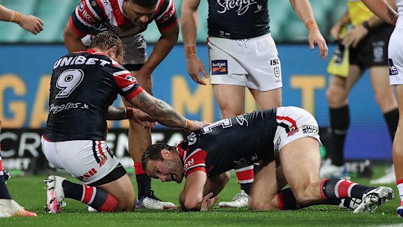 Boyd Cordner struggles to get up after hitting his head on the ground against the Knights.