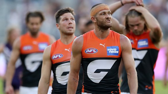 The Giants absorb a sobering defeat at Optus Stadium in Perth.