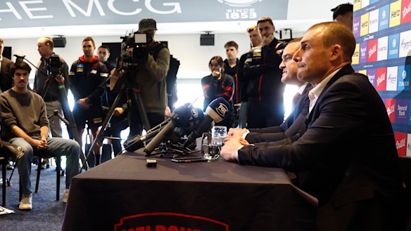 Simon Goodwin and Demons president Brad Green at the media conference to announce his departure.