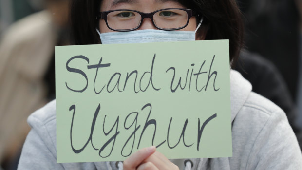 A Hong Kong protester shows support for Uighurs and their fight for human rights.