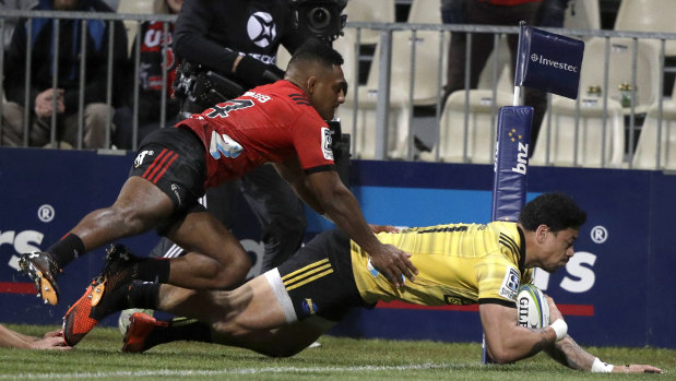 Game of fine margins: Ben Lam goes over out wide for the Hurricanes.