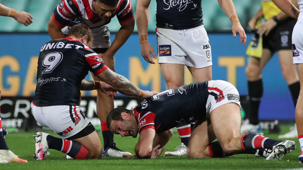 Boyd Cordner struggles to get up after hitting his head on the ground against the Knights.