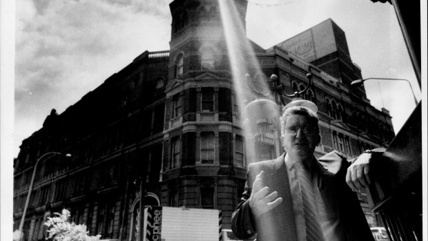 Ray of hope: Vince Higgins, secretary of the Federated Clerks Union, in front of the old Trades Hall building in Haymarket, which has been reprieved from demolition, 1987.