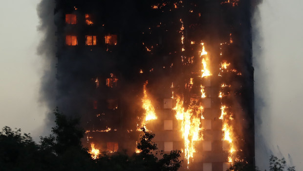 The Grenfell Tower building on fire in June 2017.