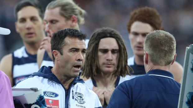 Loud and clear: Cats coach Chris Scott marshalls his troops during a break at GMHBA Stadium in Geelong.