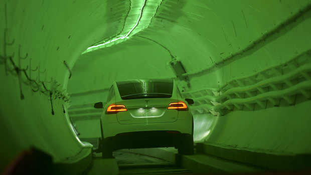 Elon Musk unveiled his underground transport tunnel for reporters and guests.