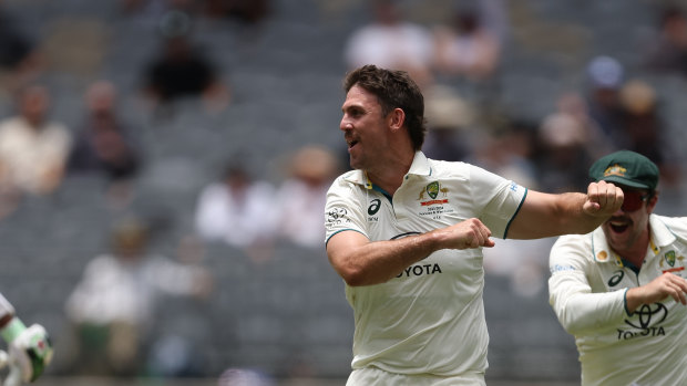 PERTH, AUSTRALIA - DECEMBER 16: Mitchell Marsh of Australia celebrates the wicket of Babar Azam of Pakistan during day three of the Men’s First Test match between Australia and Pakistan at Optus Stadium 