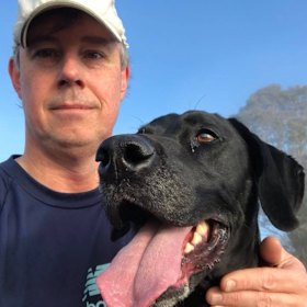 Shane Wright and his dog, Scully, out on a run.
